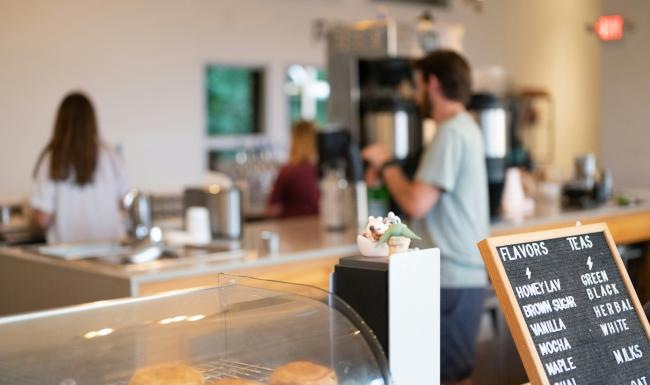 a person standing in a restaurant