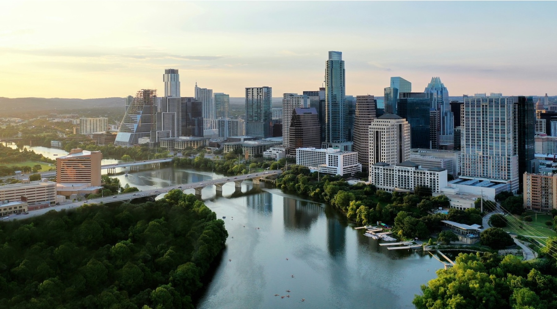 a skyline of a city at dusk